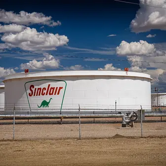 Rows of cylindrical crude oil storage tanks